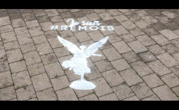 Marquage sur un trottoir à Reims